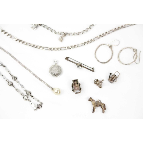 294 - A collection of silver jewellery Including a figaro chain 23