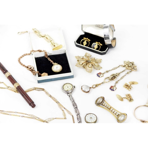 295 - A collection of costume jewellery and accessories. To include a gold-plated lorgnette, a fountain pe... 