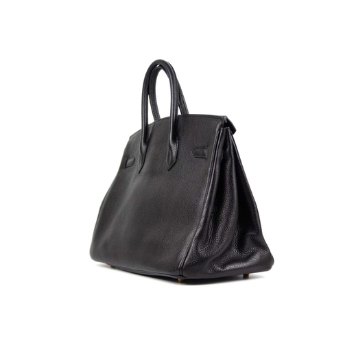 302 - HERMES - A Birkin 35 black Togo leather retourne handbag, circa 2010 With polished gold-tone hardwar... 