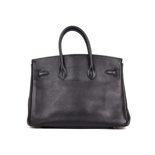 302 - HERMES - A Birkin 35 black Togo leather retourne handbag, circa 2010 With polished gold-tone hardwar... 