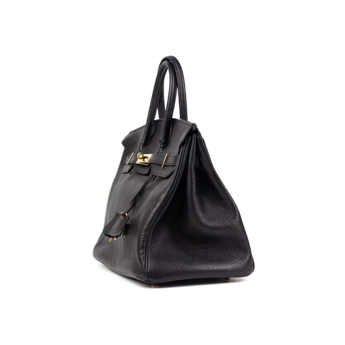 302 - HERMES - A Birkin 35 black Togo leather retourne handbag, circa 2010 With polished gold-tone hardwar... 