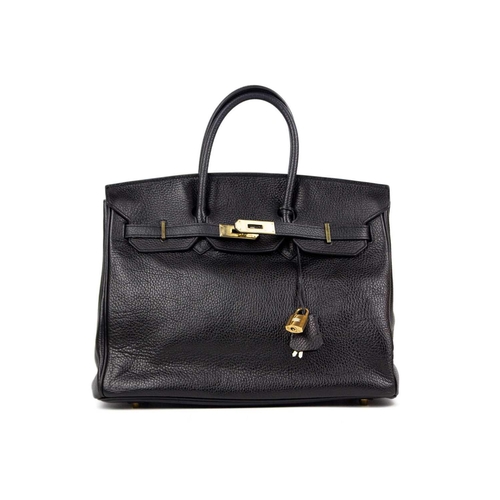 302 - HERMES - A Birkin 35 black Togo leather retourne handbag, circa 2010 With polished gold-tone hardwar... 