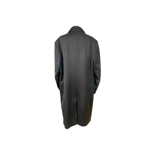 305 - A gentleman's black wool double breast overcoat with Astrakhan fur collar, by A. Oakes. Size large a... 