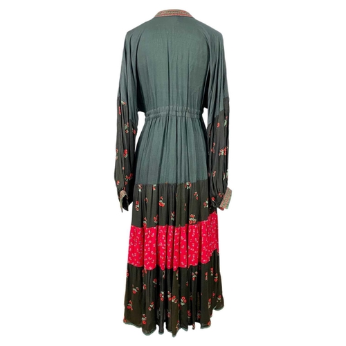 308 - A 1970's Afghanistan black and red cotton maxi dress. The front with beaded detail, length 52