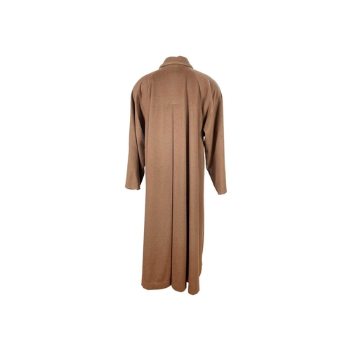 313 - CHRISTIAN DIOR - A 1950's ladies brown camel overcoat. With padded shoulders, armpit to armpit 19.5