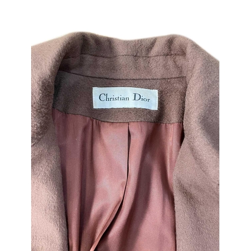 313 - CHRISTIAN DIOR - A 1950's ladies brown camel overcoat. With padded shoulders, armpit to armpit 19.5