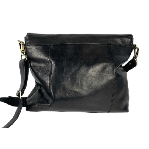 317 - A Tumble & Hide black leather messenger bag. Width 38cm. With dust cover and papers.