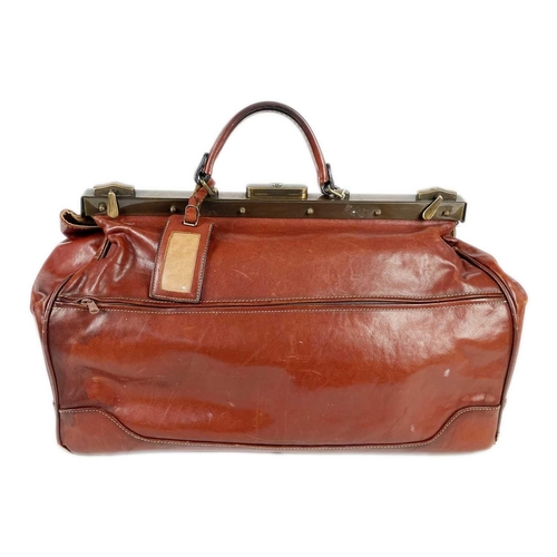 318 - A Texier France tan leather Gladstone type bag. With brass hardware and two interior zips, width 45c... 