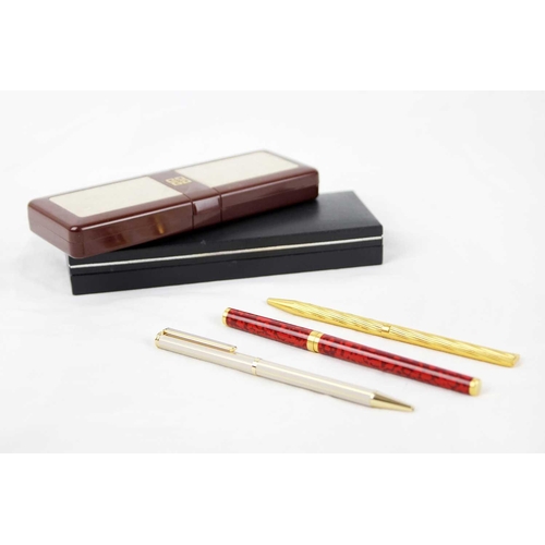 321 - Two SJ Dupont ball pens together with Givenchy ball pen The red pen is Paris Laque de Chine , the go... 