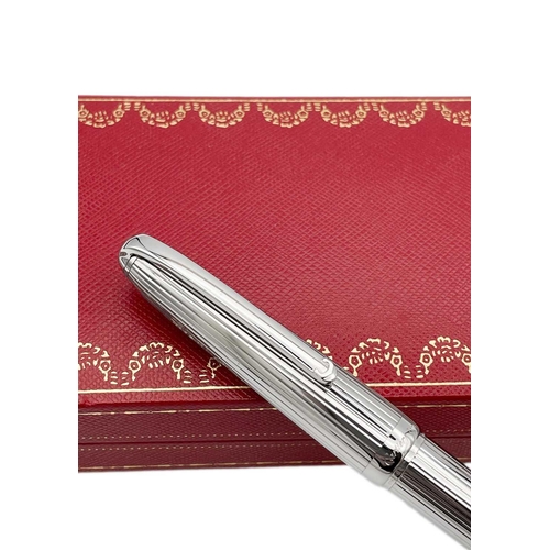 323 - A Stylo Louis Cartier platinum finish ballpoint pen The ballpoint pen is fitted with a high-presisio... 