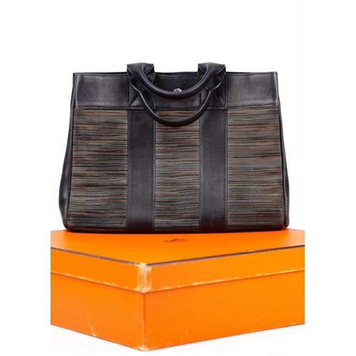 324 - A Hermès Fourre-Tout Vibrato Handbag. Black leather with multi-coloured body, 32cm wide, date stamp ... 