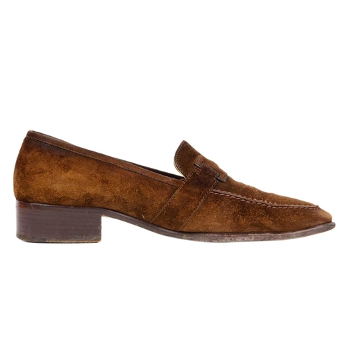 325 - Two pairs of Hermès shoes. A pair of brown suede loafers, UK size 6, with a pair of black leather po... 