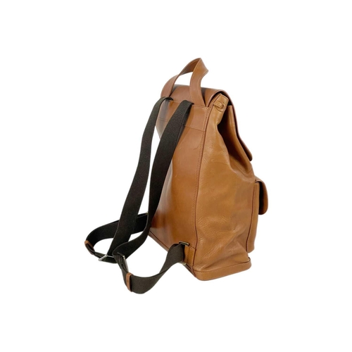 326 - ASPINAL OF LONDON - A heritage style tan leather drawstring backpack. The front with a pair of envel... 