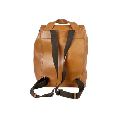 326 - ASPINAL OF LONDON - A heritage style tan leather drawstring backpack. The front with a pair of envel... 