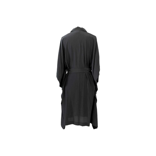 327 - Four Hermès dresses and a silk Hermès roll neck top. A black 100% wool dress with an integrated jack... 