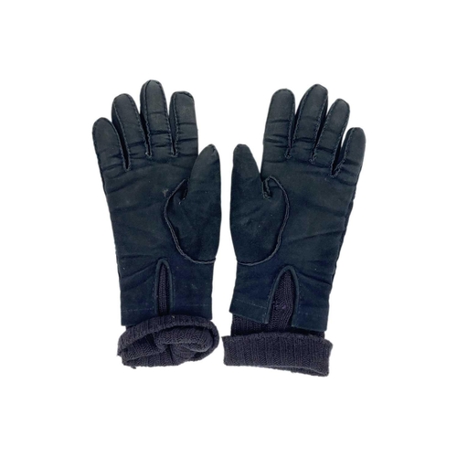 329 - Two pairs of Hermes suede gloves. One pair in black made from soft kid suede with chrome buckle deta... 