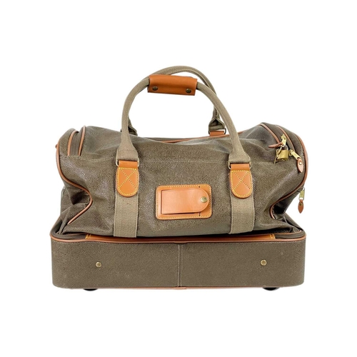 351 - MULBERRY - A Scotchgrain holdall in two sections with rolling wheels. With canvas straps and trim, o... 