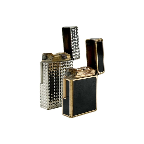 353 - S. T. DUPONT - Two lighters. One in a chrome nickel case, with box and papers, the other gold plated... 