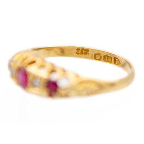 50 - A Victorian 18ct hallmarked gold diamond and ruby set five stone ring. In a boat shaped setting, Che... 