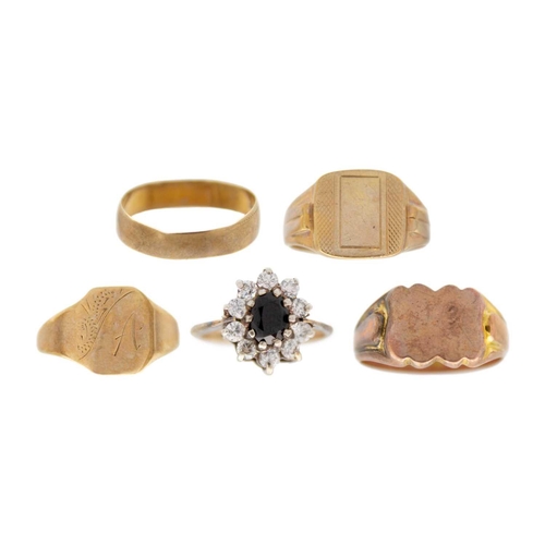 51 - A selection of four 9ct hallmarked gold rings and a 9ct and silver cluster ring. To include a rose g... 