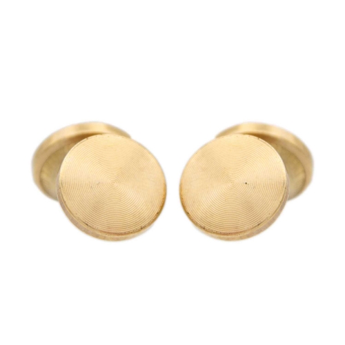 52 - A pair of 9ct hallmarked gold engine-turned oval cufflinks. Weight 3.6g; together with a pair of gol... 