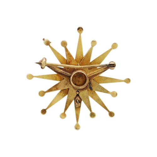 69 - A Victorian gold split pearl set star brooch. Width 38mm, 8.8g.