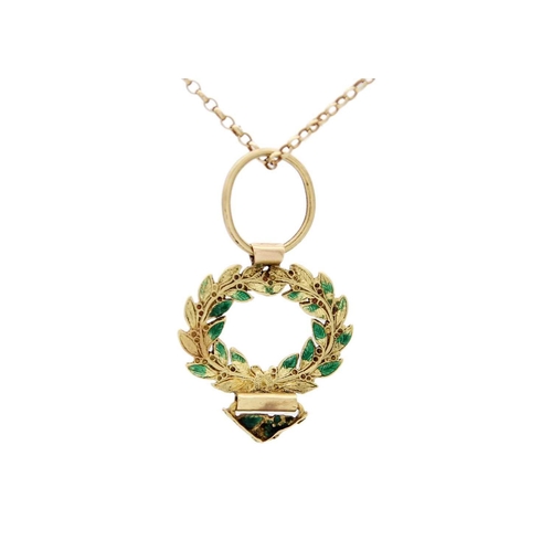 75 - A small 18ct (tested) green enamel applied wreath pendant, on a modern 9ct necklace. Width 22mm, 3.4... 