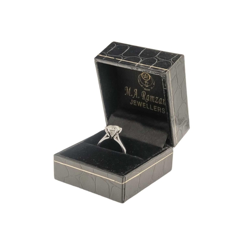 9 - An impressive 1.97ct diamond set solitaire ring set in platinum. The stone of round brilliant cut in... 