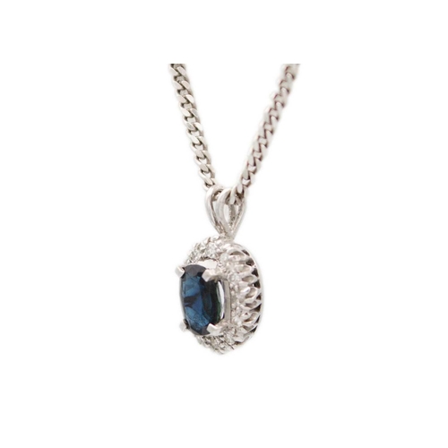 92 - An 18ct white gold sapphire and diamond cluster pendant and a pair of similar 9ct cluster earrings. ... 