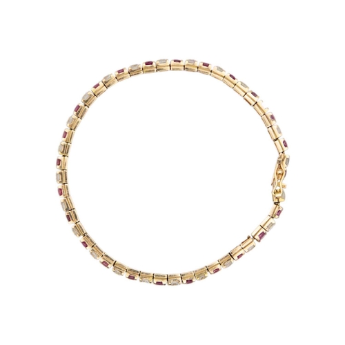 93 - 14k gold ruby, white spinel tennis bracelet Stamped 585k on a clasp, length 19cm, 11.7g.