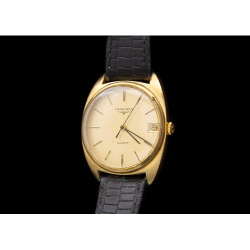 102 - LONGINES - A gold-plated gent's quartz wristwatch and a lady's manual wind wristwatch. The gent's wa... 