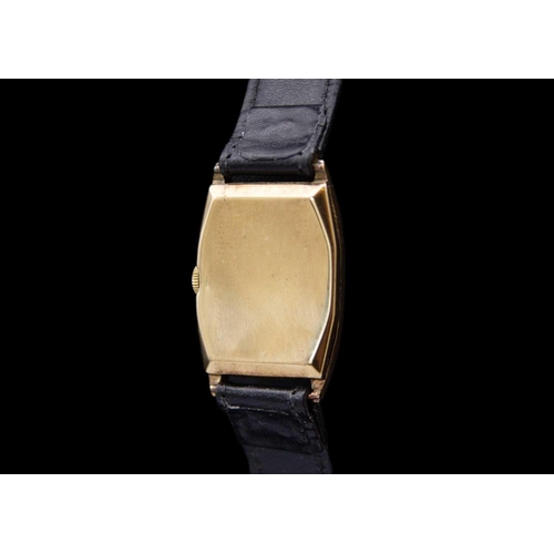 116 - BRAVINGTONS - A Renown 1930's 9ct tonneau case manual wind gentleman's wristwatch. The 18mm rectangu... 