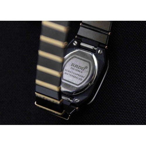 140 - RADO - A Jubile Diamond Star lady's black ceramic and gold-plated quartz bracelet wristwatch. Ref. 2... 