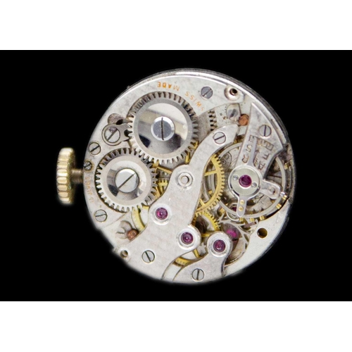 166 - A 9ct lady's manual wind bracelet wristwatch. The 16mm gold and silvered dial with black Arabic nume... 