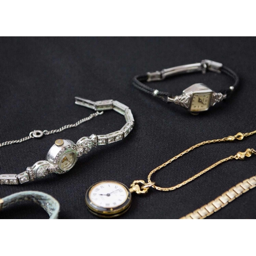 174 - A collection of lady's pocket and wristwatches, as well as a pocket watch seal and fob.. To include ... 