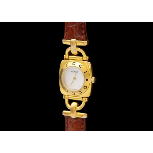 194 - GUCCI - Three lady's quartz wristwatches within boxes. One is ref. 6400L, circa 1996, original leath... 