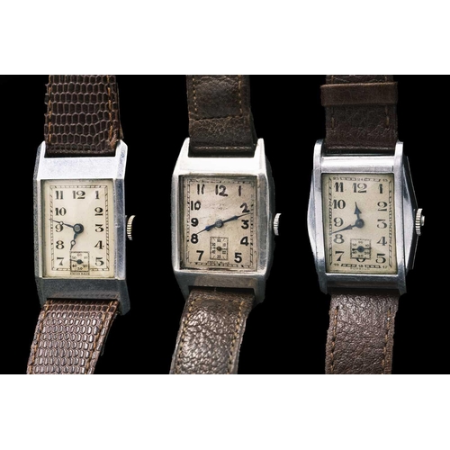 198 - Three Art Deco gentleman's manual wind tank wristwatches. One in a silver case, with a silvered rect... 