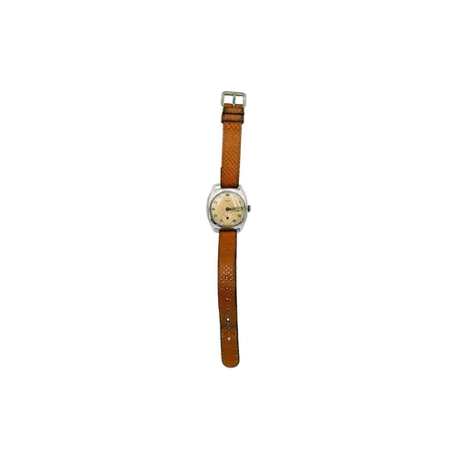 206 - TUDOR - A 1940's nickel cased gentleman's mid-sized manual wind wristwatch. Circa 1947, the 22mm sig... 