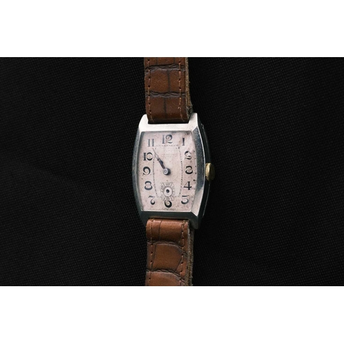 221 - Three Art Deco gentleman's manual wind tank wristwatches. One by Winegartens, in a nickel case, the ... 