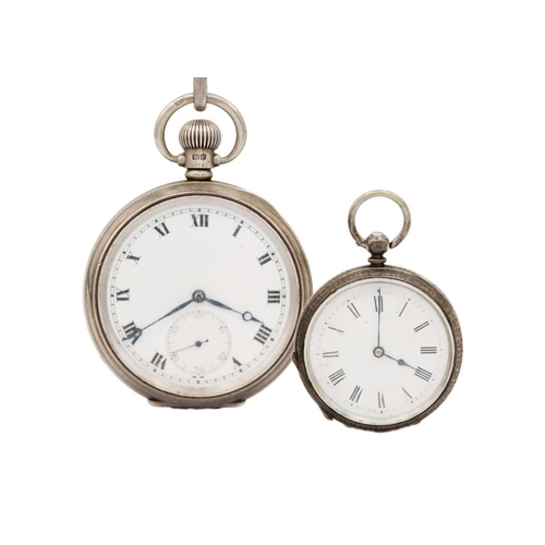 227 - A silver crown wind pocket watch with Albert watch chain, shield fob. and fob watch. The pocket watc... 