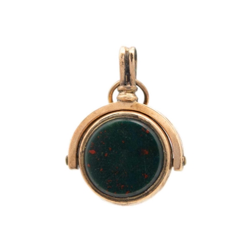 250 - A rose gold carnelian and bloodstone small swivel fob. Width 17mm, 3.4g.