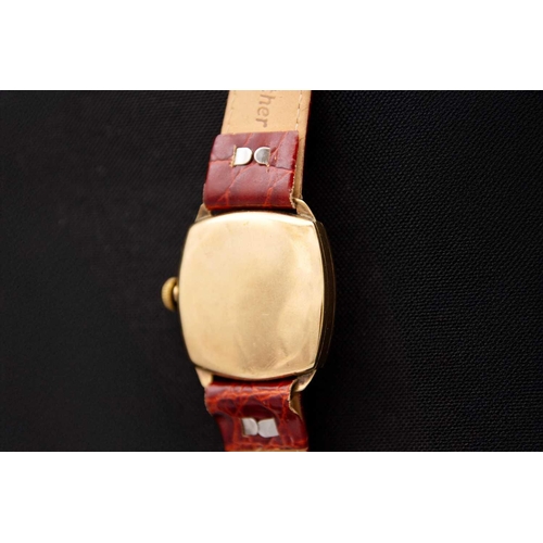 66 - WALTHAM - A 9ct cased 1930's cushion cased gentleman's manual wind wristwatch. The 25mm white enamel... 