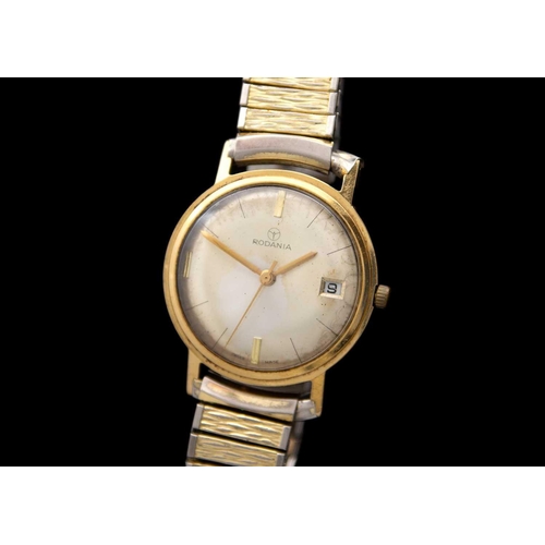 71A - RODANIA - A 9ct cased 1960's gentleman's manual wind wristwatch. The signed 28mm silvered dial with ... 