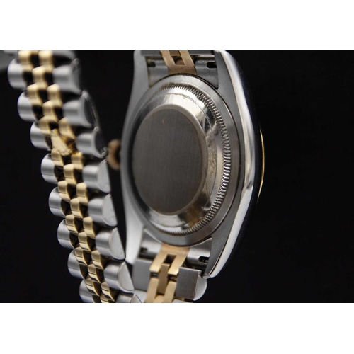 74 - ROLEX - An Oyster Perpetual Datejust gentleman's 18ct gold and stainless steel bracelet wristwatch. ... 