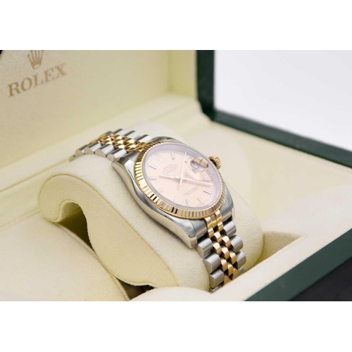 74 - ROLEX - An Oyster Perpetual Datejust gentleman's 18ct gold and stainless steel bracelet wristwatch. ... 