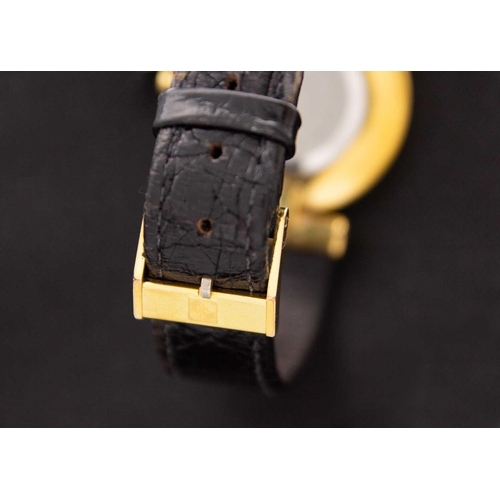 87 - ZENITH - A gold-plated unisex quartz wristwatch. Ref. 27.2010.081, circa 1970, signed 22mm black dia... 