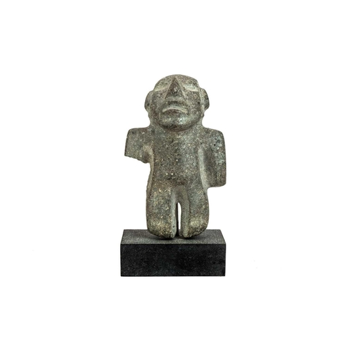 1060 - A Mezcala standing figure. Mexico 600BC-200AD, height 14.5cm, on a stand overall height 17cm. From P... 