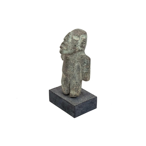 1060 - A Mezcala standing figure. Mexico 600BC-200AD, height 14.5cm, on a stand overall height 17cm. From P... 