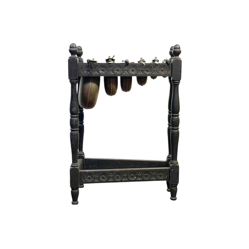 31 - An oak framed xylophone or metallophone. Circa 1920, with six copper resonators, with brass bars, wi... 