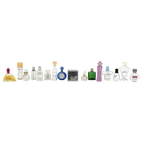 6 - A large collection of miniature scent bottles. In excess of 100 bottles.